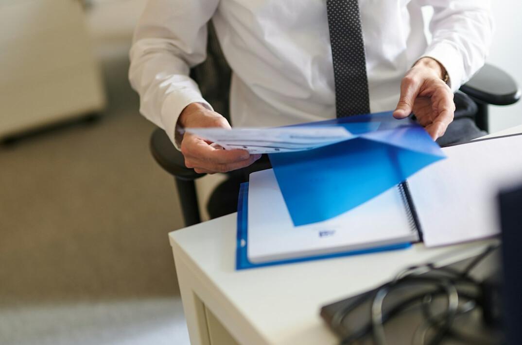 person reviewing investment portfolio